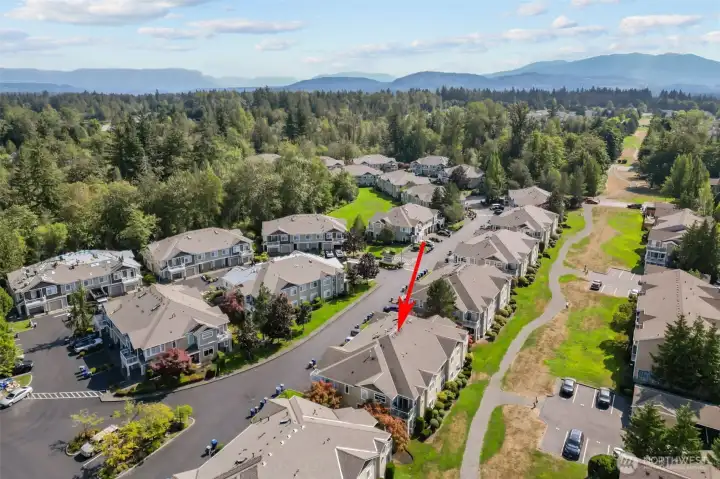 Resort-style amenities including outdoor pool, clubhouse, gym, and walking trails