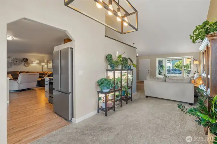 Looking from Dining Room into Kitchen and Living Room