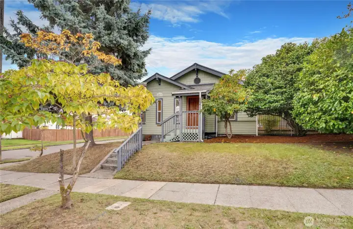 With a brand new roof, a 2-car garage, an unfinished basement, and a fenced yard flanked by rose bushes still in bloom, this South End home has more to offer than its square feet can describe.