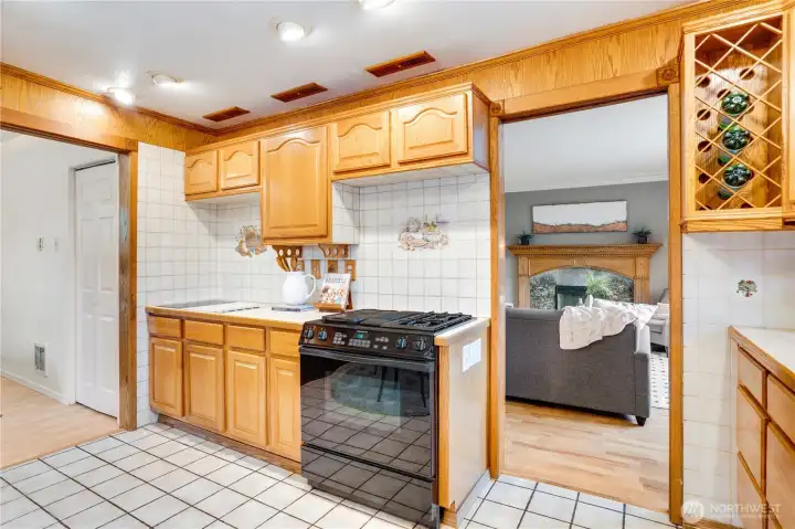 Cook with gas on the oven/range with plentiful overhead lighting to keep the kitchen bright.