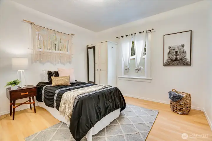 The front bedroom is located just off the living room next to the full bath.