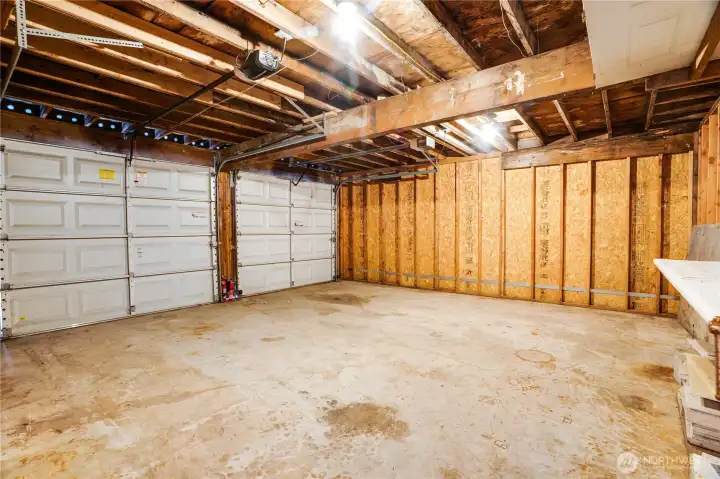 This is a 600 sq ft detached garage building with room for parking and an attached workshop too.