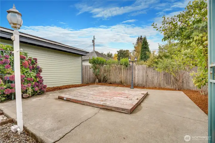 This patio is a perfect spot to set up an outdoor dining area for summer barbecues. On clear days you can even get a view to the mountains from here.