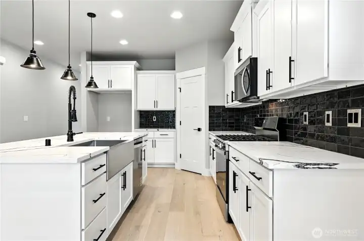 photos of same plan built on a different lot. Details will vary