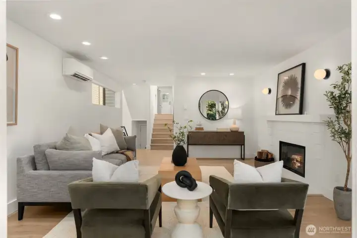 A short flight of stairs takes you to the rest of the entertaining space.