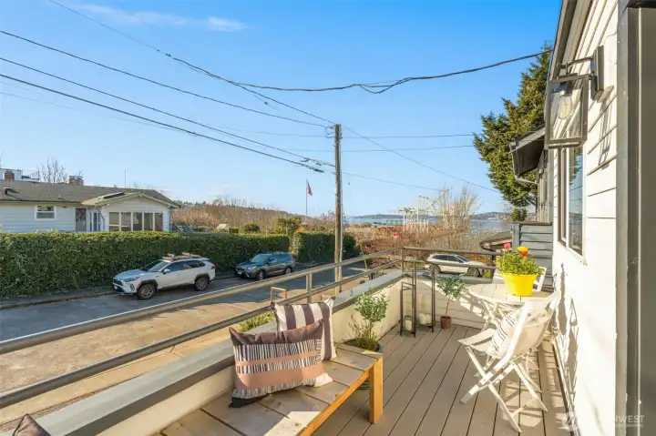 Morning coffee on your kitchen deck?  Views of the port and the sound with sunshine galore.