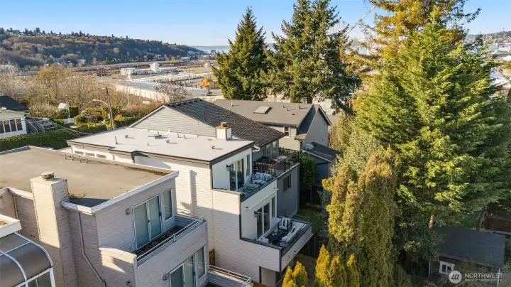 Decks for days! Home at the end of the block slated for removal when the light rail comes.