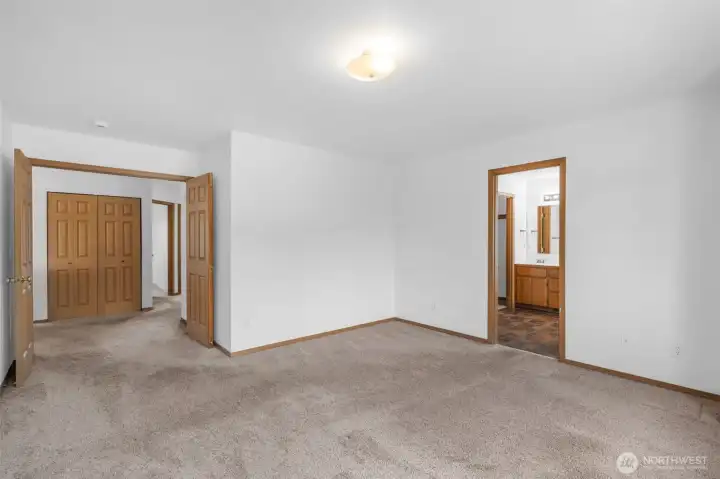 Primary bedroom with ensuite bathroom