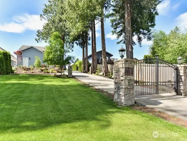 Gated entry off the street in front of the property.