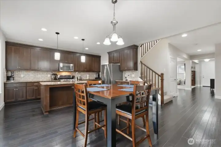 Dining area, kitchen, engineered hardwood floors