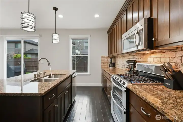 Kitchen, granite counters, double sink, island, engineered hardwood floors