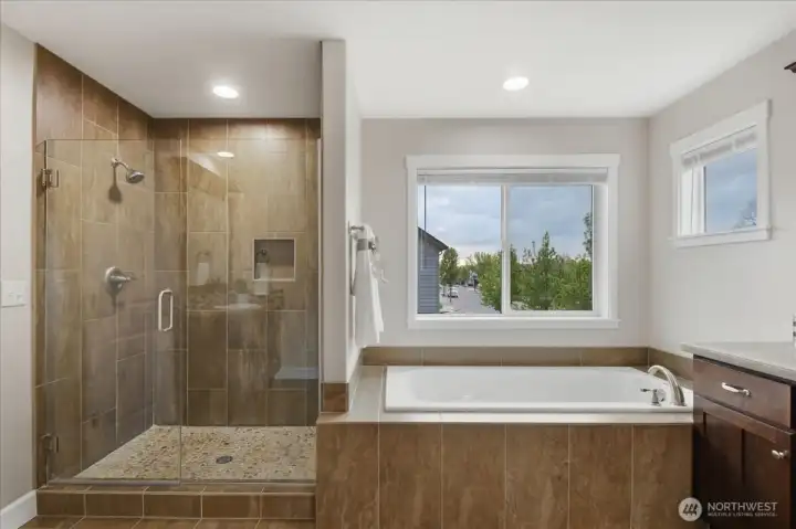 Primary bathroom, walk-in tile shower, soaking tub
