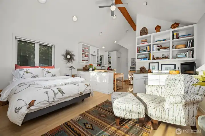 There is plenty of room for a queen-sized bed and nightstands in the sleeping area. There is plenty of room for a queen-sized bed and nightstands in the sleeping area.