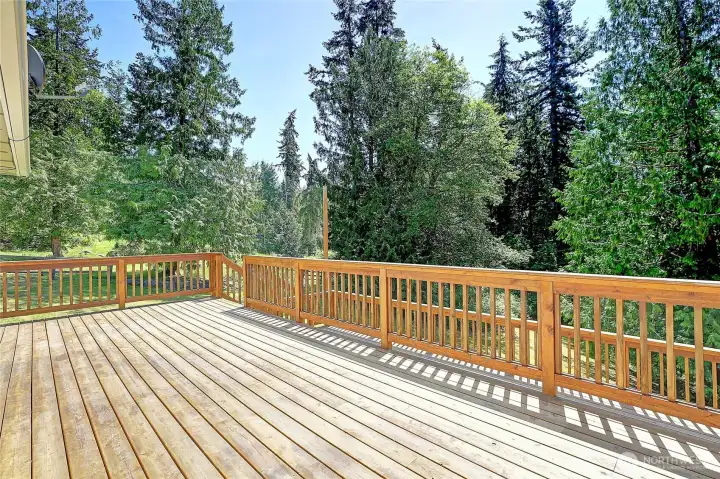 Expansive two tier deck, just off kitchen and living room.