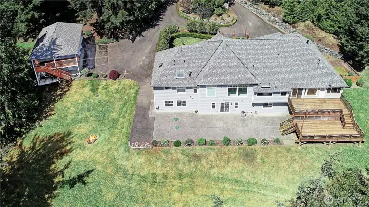 Back of the home offers endless entertainment & recreation space.