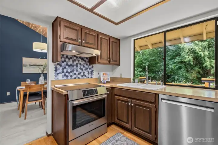 Enjoy the view of lush greenery from the kitchen Enjoy the view of lush greenery from the kitchen
