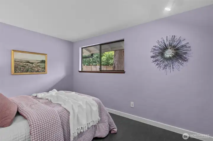 Second bedroom features lavender walls Second bedroom features lavender walls