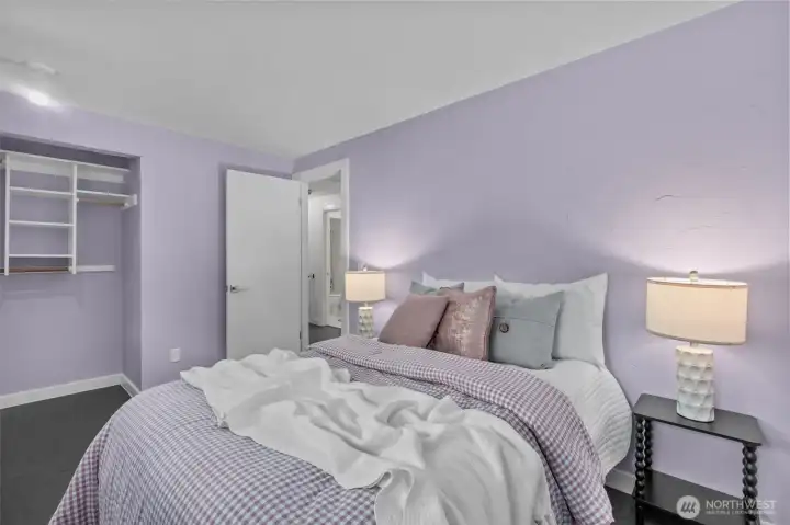 Second bedroom features lavender walls Second bedroom features lavender walls