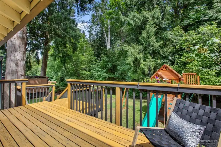 Sunny deck with newer decking offers plenty of space to enjoy the outdoors Sunny deck with newer decking offers plenty of space to enjoy the outdoors