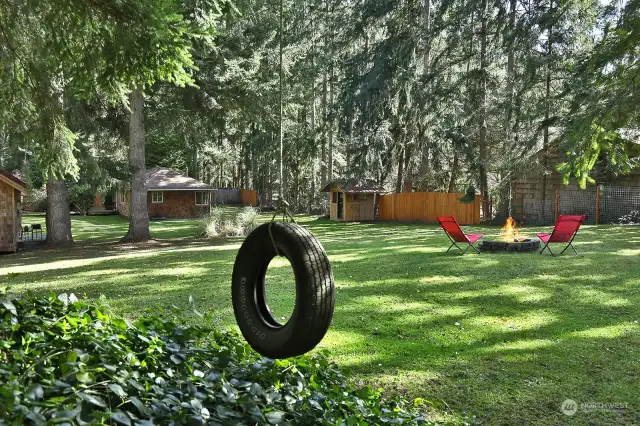 Get in the swing of things with this old fashioned tire swing.