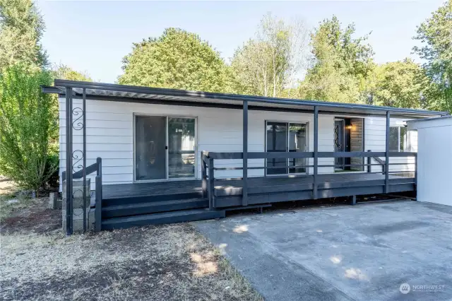 Expansive covered front porch welcomes you into this beautifully remodeled home!