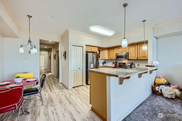 Kitchen includes a built-in breakfast bar for extra seating