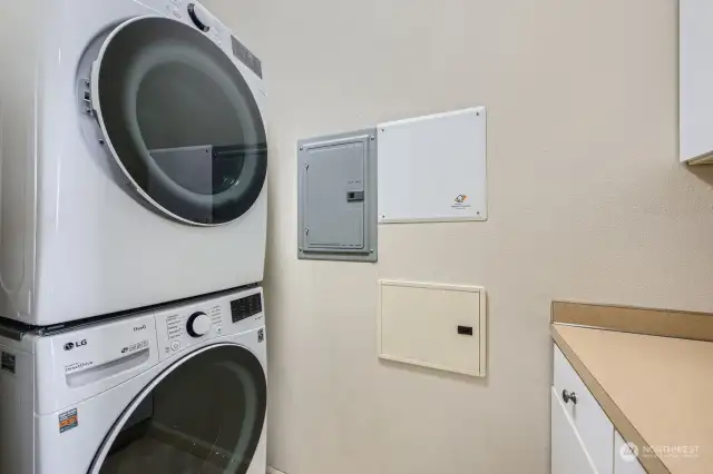 Separate laundry room with storage - full size washer & dryer included!