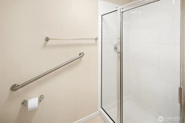 walk-in shower in primary suite