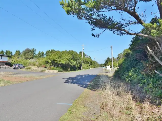 South view of Sand Dune Ave SW (lot is on the left).