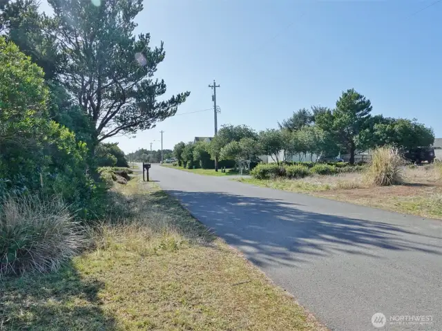 South view of Sand Dune Ave SW (lot is on the left).