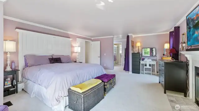 Spacious primary bedroom offering room to relax, refresh, and unwind in comfort