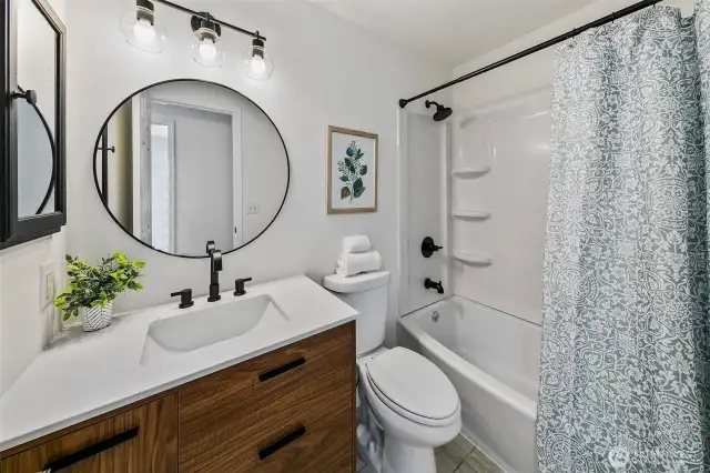 Updated full hall bath.