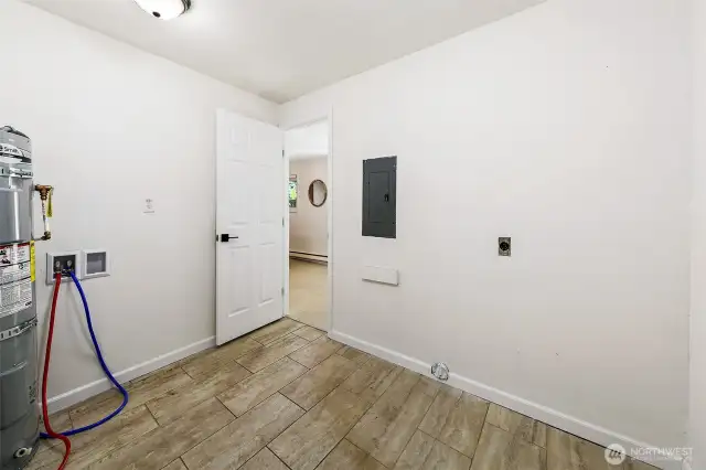 Large laundry room with washer & dryer hookups