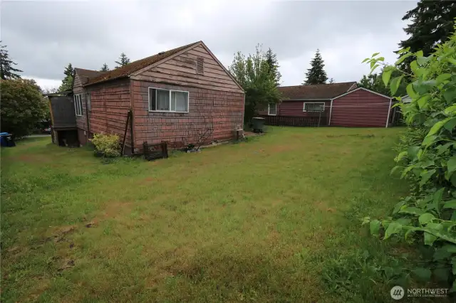 The backyard offers ample space to bring your ideas to life.
