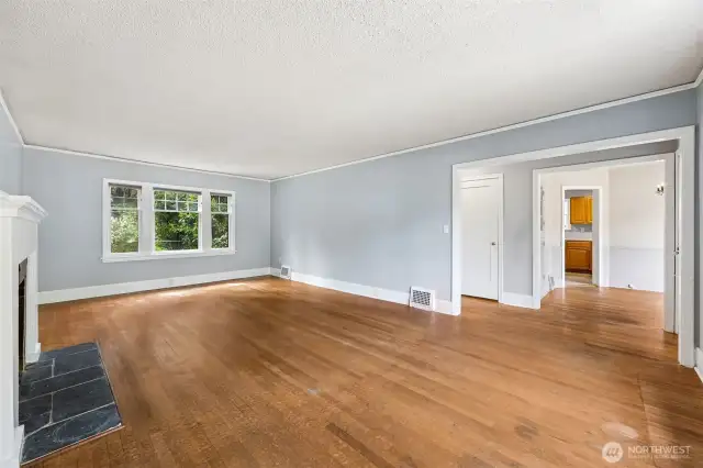 View from living room, looking towards hallway and dining room.