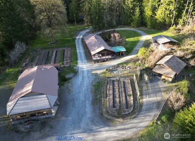 Aerial of upper property buildings and gardens