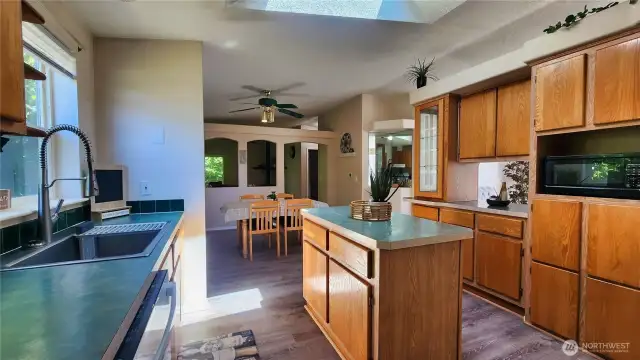 Another angle of kitchen from the laundry room and back door