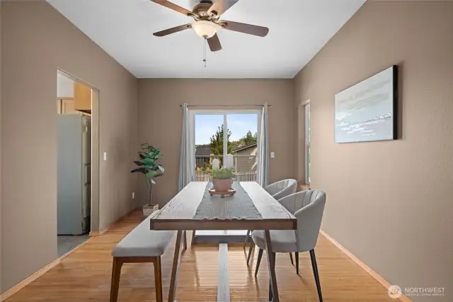 Dining area with sliding doors to access the deck.
