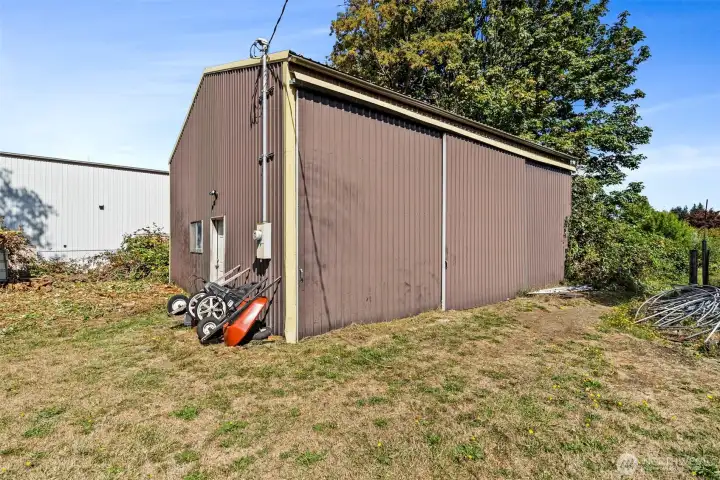1,080sf shop has its own electrical service. Inside, you'll find a walk-in cool room and a seed germination room, along with great storage. The previous owner had cattle and housed them here.