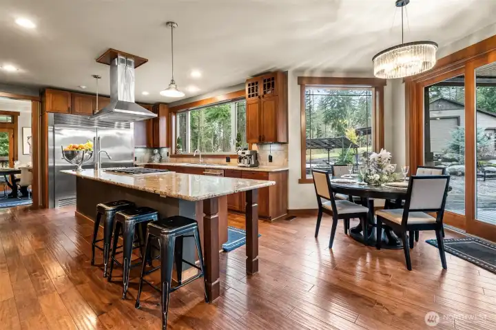 A chef’s paradise with a Jenn-Air six-burner cooktop and built-in griddle, ready for everyday cooking or entertaining