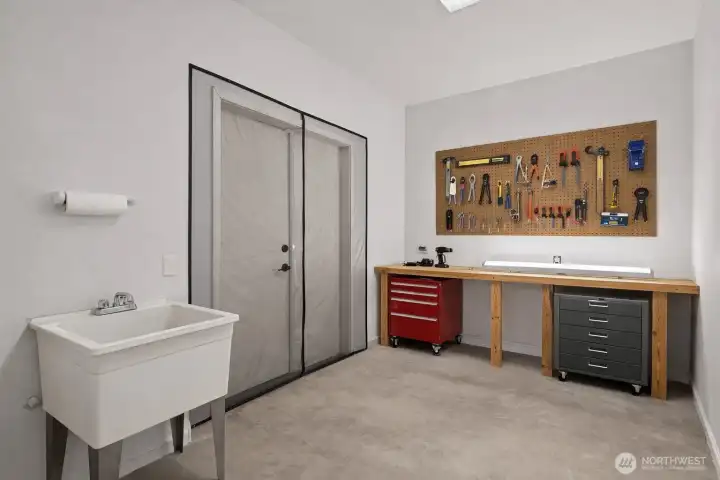 3rd Garage Bay converted to Workshop, virtually staged