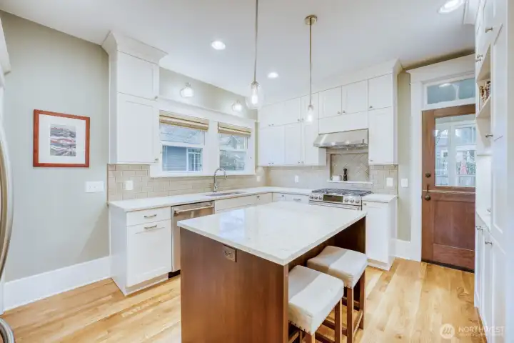 New kitchen with built-ins and breakfast bar.