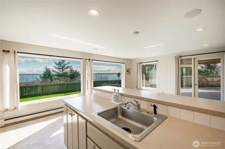 See view from behind the garden level kitchen counter.