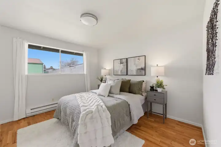The first bedroom is a great size and looks out to the backyard.