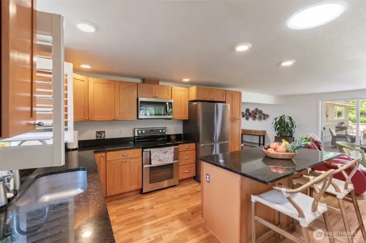 Island creates an extra eating space in kitchen Island creates an extra eating space in kitchen