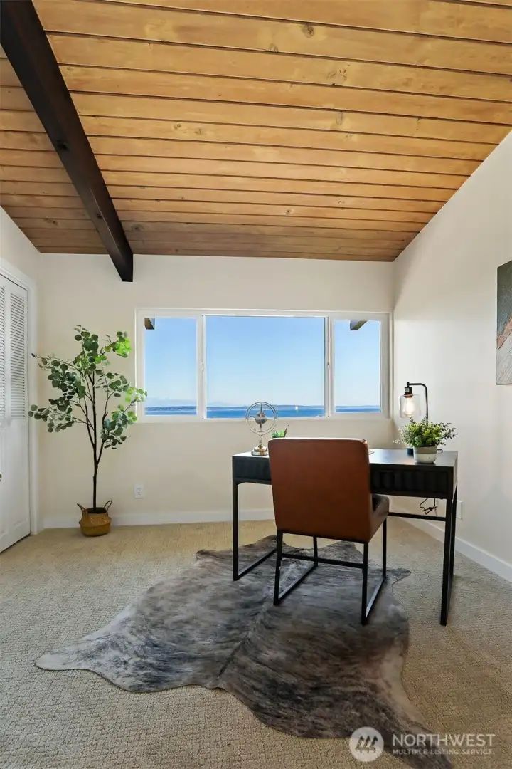 One of two bedrooms staged as an office, but room for a bed.