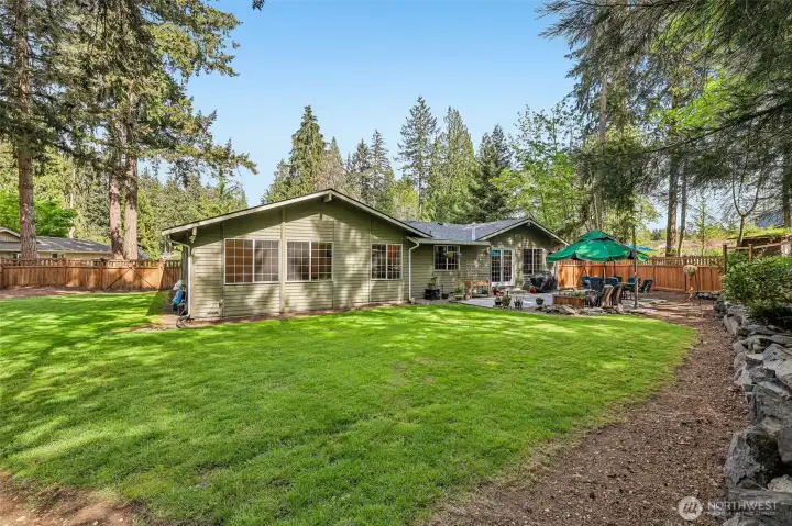 Enclosed rear yard for gardening, play, dog run or get creative!