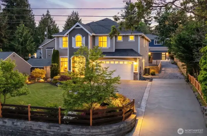 2 car attached garage, off-street parking and brand-new driveway.