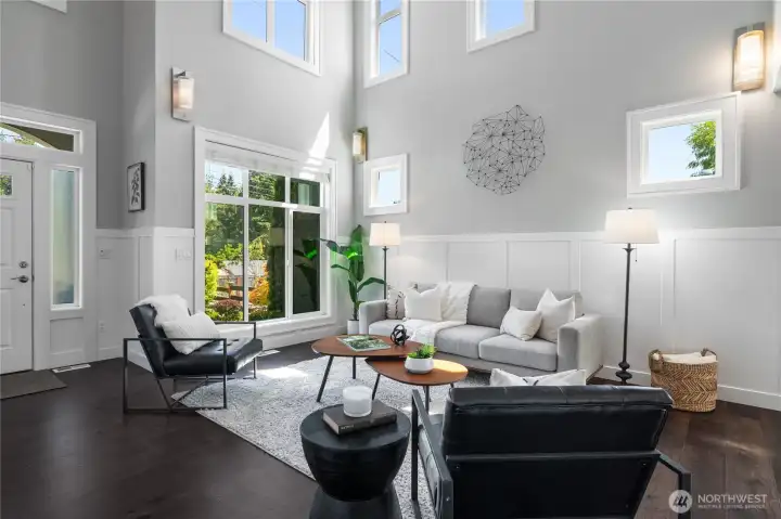 Step through the front door into bright, light-filled, vaulted living room.