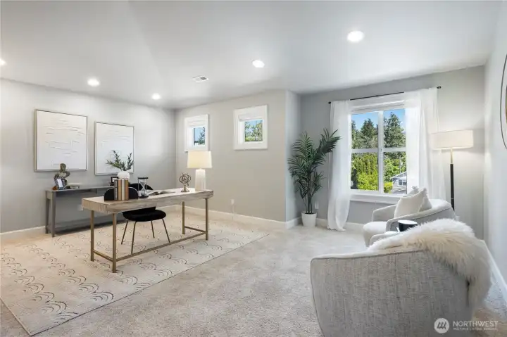 Large bonus media room - staged as an office.